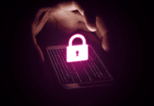 Hand holding a smartphone with a virtual lock icon.